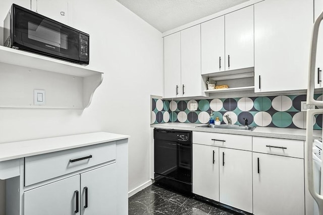19 Winchester St Unit 102, Brookline, MA 02446 - kitchen featuring black appliances, dark marble finish flooring, a sink, light countertops, and decorative backsplash