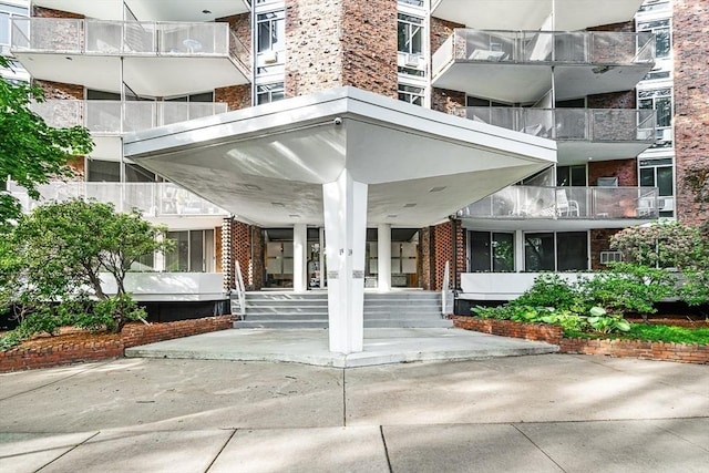 19 Winchester St Unit 102, Brookline, MA 02446 - entrance to property with brick siding