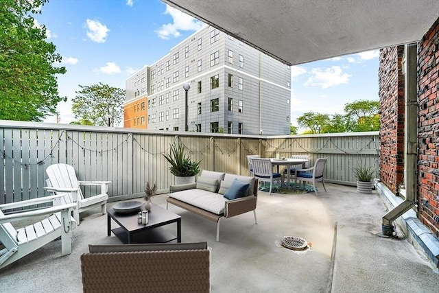 19 Winchester St Unit 102, Brookline, MA 02446 - fenced backyard featuring outdoor dining area, a patio area, and an outdoor living space