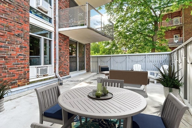 19 Winchester St Unit 102, Brookline, MA 02446 - deck with a patio area, a fenced backyard, cooling unit, and outdoor dining space