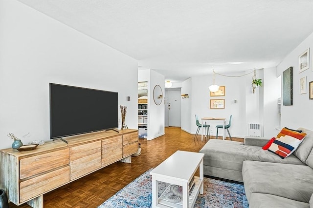 19 Winchester St Unit 102, Brookline, MA 02446 - living room featuring baseboards