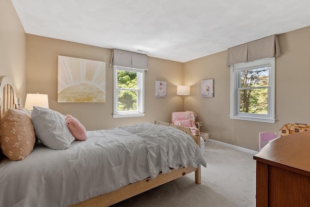 134 Reed Farm Rd, Boxborough, MA 01719 - carpeted bedroom featuring baseboards