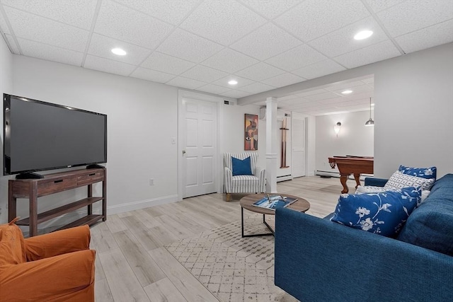 134 Reed Farm Rd, Boxborough, MA 01719 - living room with light wood-style floors, a baseboard heating unit, billiards, a paneled ceiling, and recessed lighting