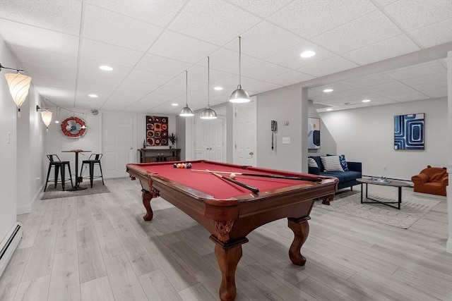 134 Reed Farm Rd, Boxborough, MA 01719 - game room with light wood-style floors, a baseboard heating unit, billiards, a drop ceiling, and baseboards