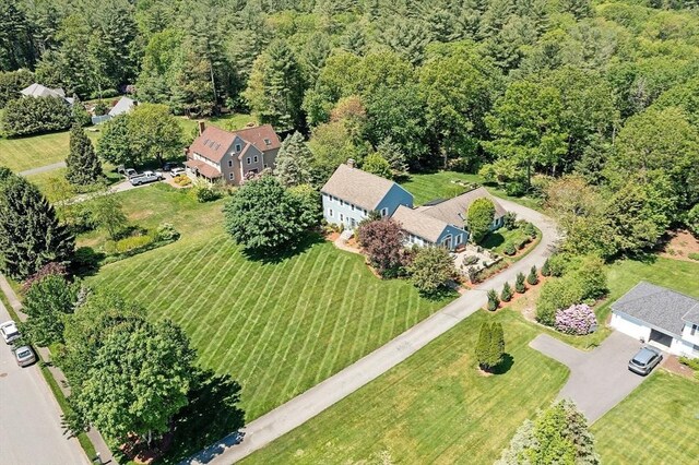 134 Reed Farm Rd, Boxborough, MA 01719 - aerial view of property and surrounding area with a heavily wooded area