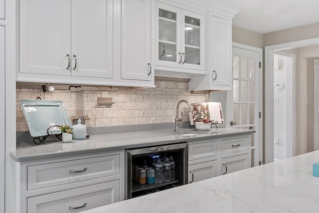 134 Reed Farm Rd, Boxborough, MA 01719 - indoor wet bar with wine cooler and tasteful backsplash