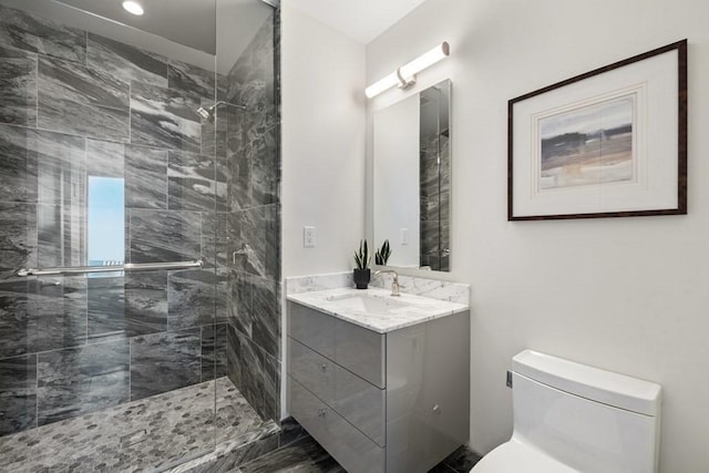 240 Devonshire St Unit 4210, Boston, MA 02110 - bathroom with a shower stall, vanity, and toilet