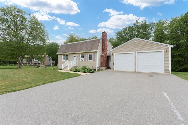 421 Gray Ter, Dighton, MA 02764 - colonial inspired home with a garage, an outdoor structure, a chimney, and a front yard