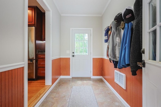 421 Gray Ter, Dighton, MA 02764 - doorway with a wainscoted wall, crown molding, wood walls, and light tile patterned floors