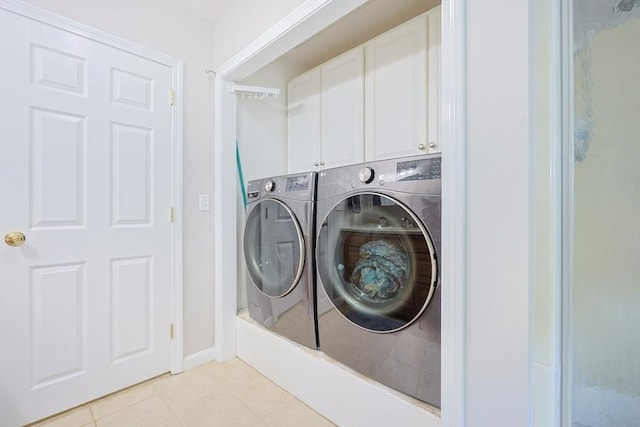 421 Gray Ter, Dighton, MA 02764 - laundry room with separate washer and dryer, cabinet space, light tile patterned flooring, and baseboards