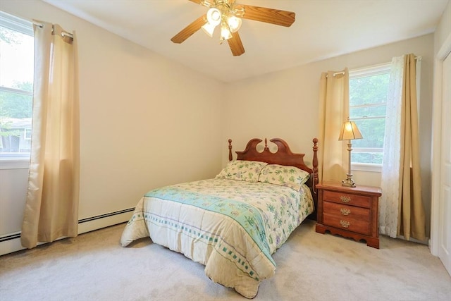421 Gray Ter, Dighton, MA 02764 - bedroom with carpet floors, multiple windows, a baseboard heating unit, and ceiling fan
