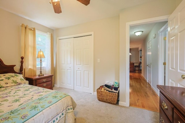 421 Gray Ter, Dighton, MA 02764 - bedroom with a closet, light carpet, ceiling fan, and baseboards
