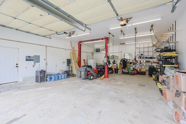 421 Gray Ter, Dighton, MA 02764 - garage with electric panel and a garage door opener