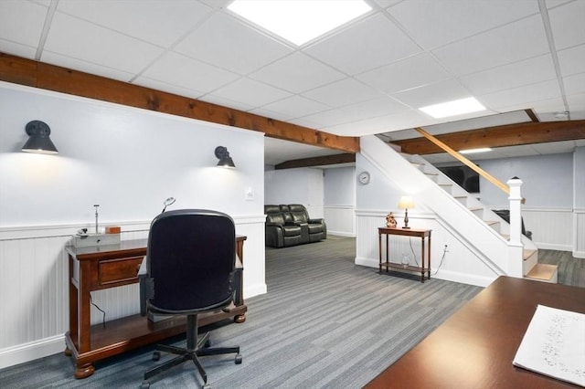 office with a paneled ceiling