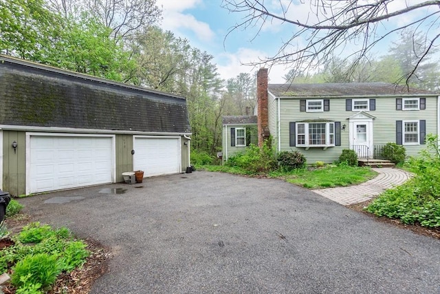 378 Linebrook Rd, Ipswich, MA 01938 - view of front of home featuring a chimney and an outdoor structure