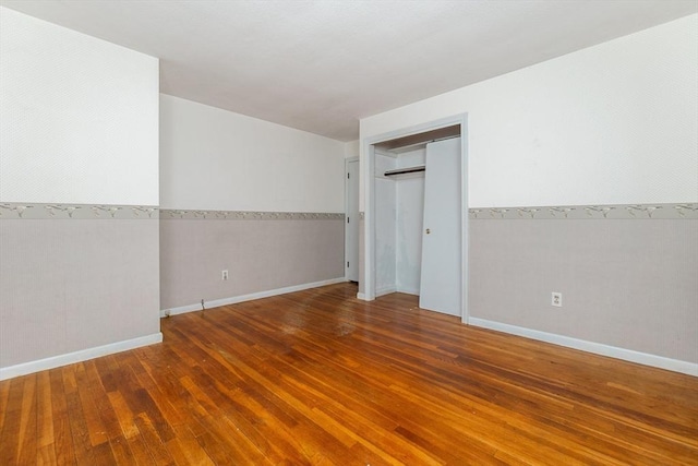 378 Linebrook Rd, Ipswich, MA 01938 - unfurnished bedroom featuring wood finished floors