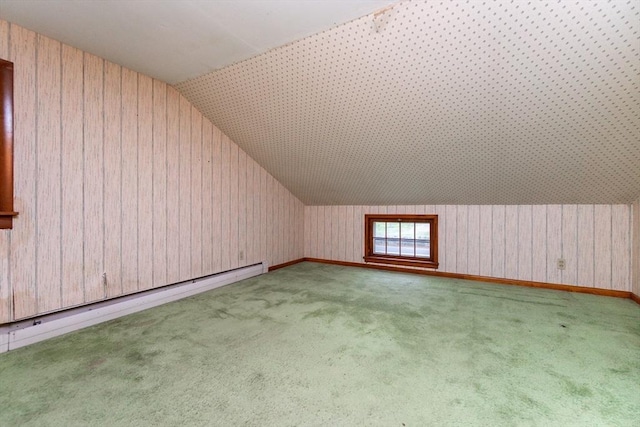 378 Linebrook Rd, Ipswich, MA 01938 - additional living space with vaulted ceiling, wood walls, baseboard heating, and carpet
