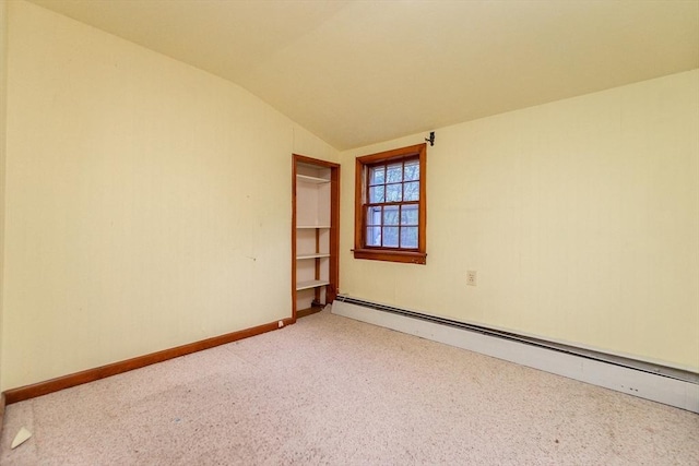 378 Linebrook Rd, Ipswich, MA 01938 - spare room featuring a baseboard heating unit, lofted ceiling, light colored carpet, and baseboards