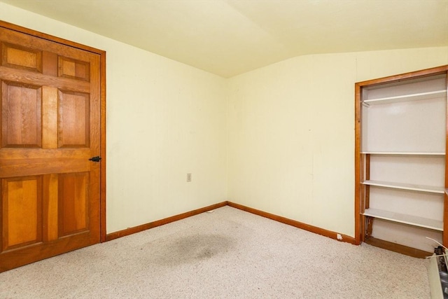 378 Linebrook Rd, Ipswich, MA 01938 - unfurnished bedroom featuring carpet flooring, lofted ceiling, and baseboards