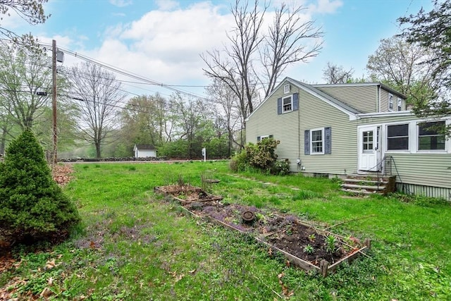 378 Linebrook Rd, Ipswich, MA 01938 - view of green lawn featuring a garden