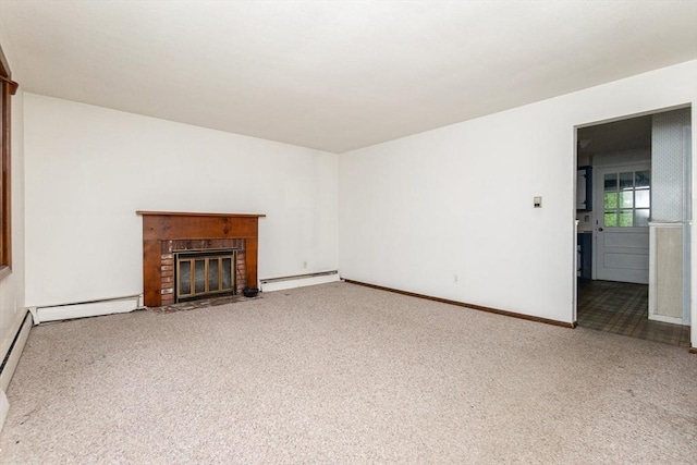 378 Linebrook Rd, Ipswich, MA 01938 - unfurnished living room with baseboard heating, carpet flooring, a brick fireplace, and baseboards