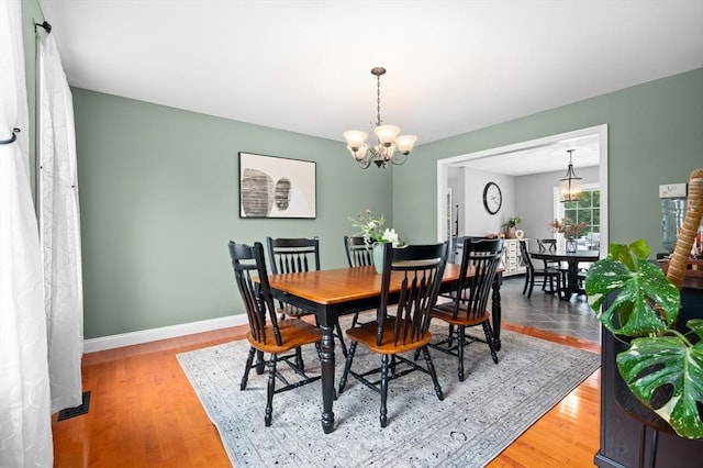 100 Overlook Ter, Dracut, MA 01826 - dining area featuring a chandelier and wood finished floors