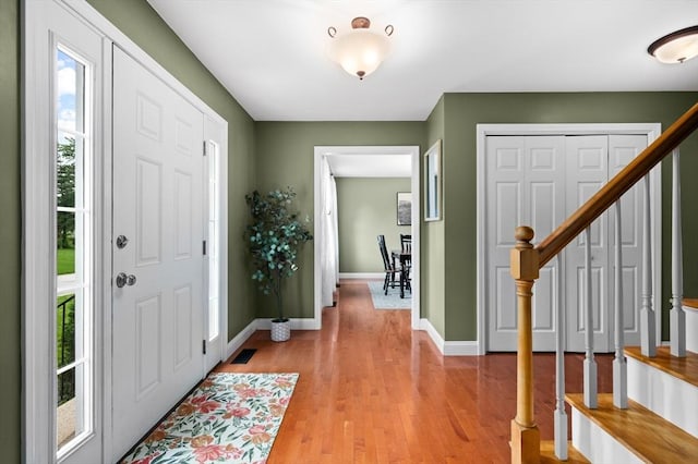 100 Overlook Ter, Dracut, MA 01826 - entryway with stairway and light wood finished floors