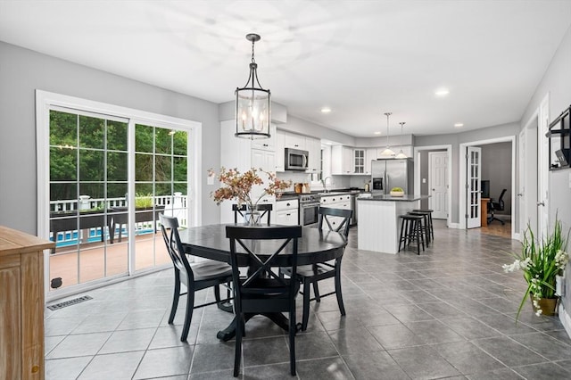 100 Overlook Ter, Dracut, MA 01826 - dining area featuring recessed lighting and dark tile patterned flooring