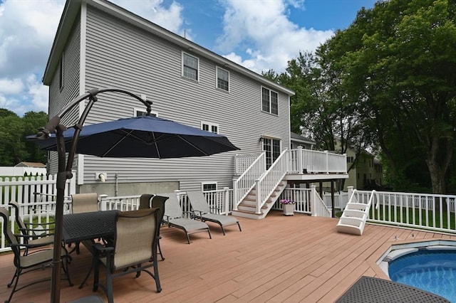 100 Overlook Ter, Dracut, MA 01826 - wooden terrace featuring stairway and outdoor dining space