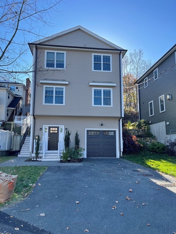 front of property featuring a garage