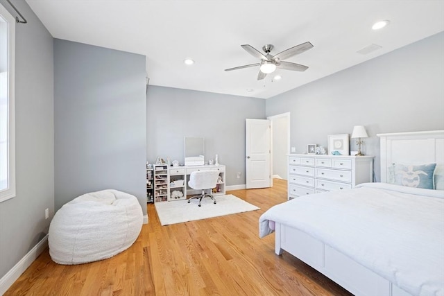 bedroom featuring light wood-style floors, baseboards, visible vents, and recessed lighting