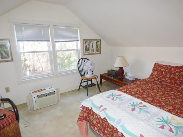 carpeted bedroom with vaulted ceiling and a wall unit AC