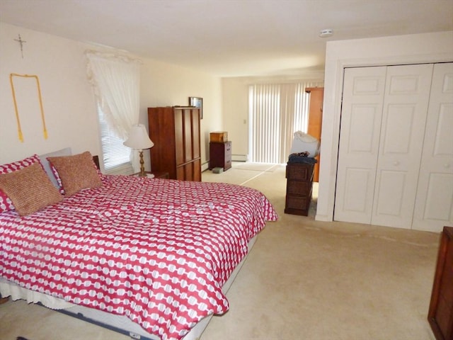 carpeted bedroom with a closet