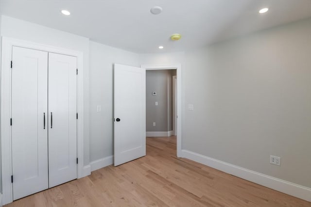 unfurnished bedroom with light hardwood / wood-style floors