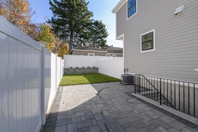 view of patio with central air condition unit