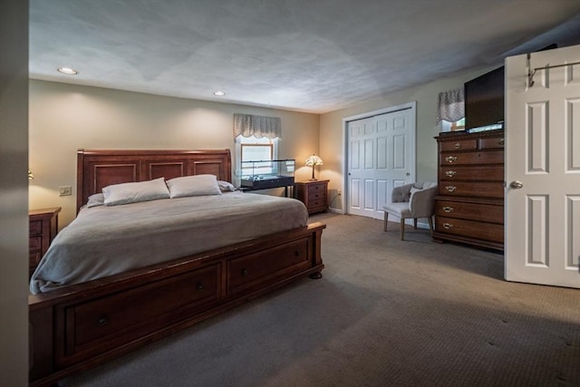bedroom with carpet floors and recessed lighting