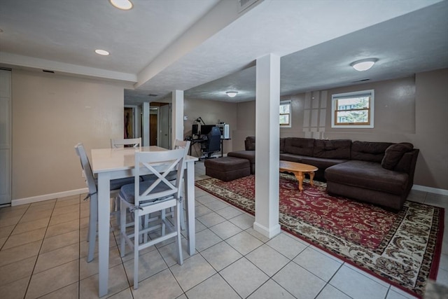 dining space featuring baseboards, light tile patterned floors, and recessed lighting