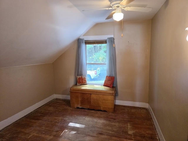 additional living space featuring lofted ceiling, ceiling fan, and dark wood-type flooring