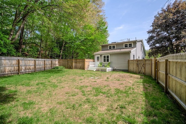 view of yard with a deck