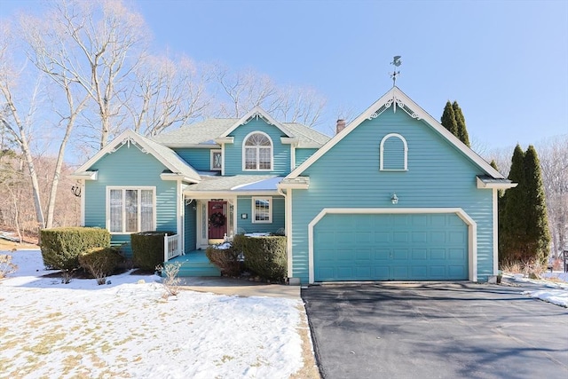 view of front of home with a garage