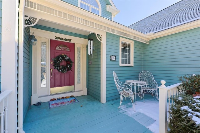 doorway to property featuring a porch