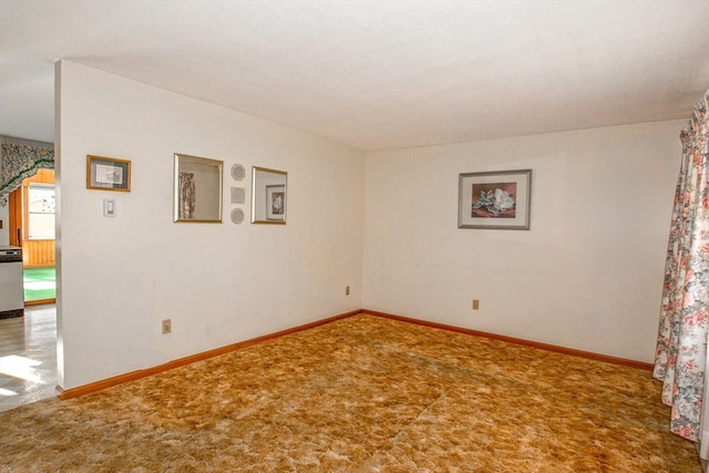 view of carpeted spare room