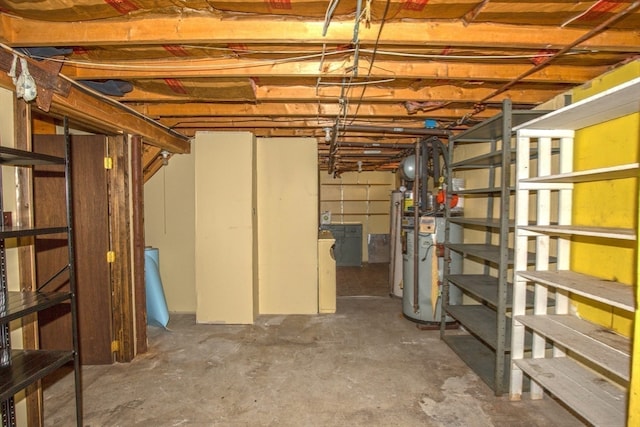 basement featuring gas water heater