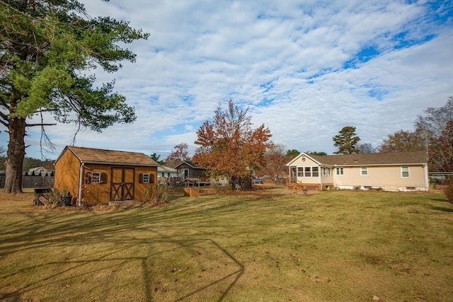 view of yard with a storage unit