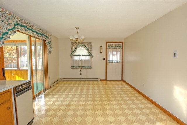 interior space featuring a healthy amount of sunlight, an inviting chandelier, and a baseboard heating unit