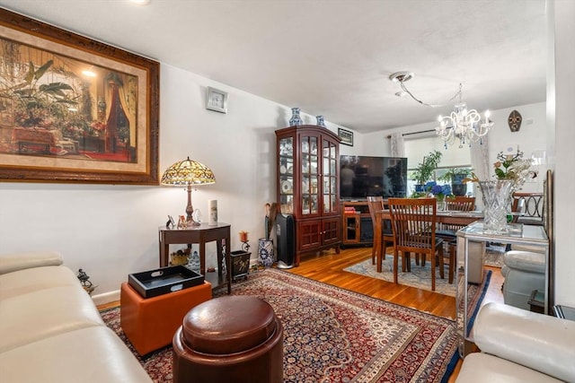 80 Messinger St, Boston, MA 02126 - living room with a chandelier and wood finished floors