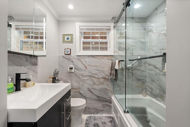 80 Messinger St, Boston, MA 02126 - full bathroom with tile walls, vanity, ornamental molding, toilet, and combined bath / shower with glass door