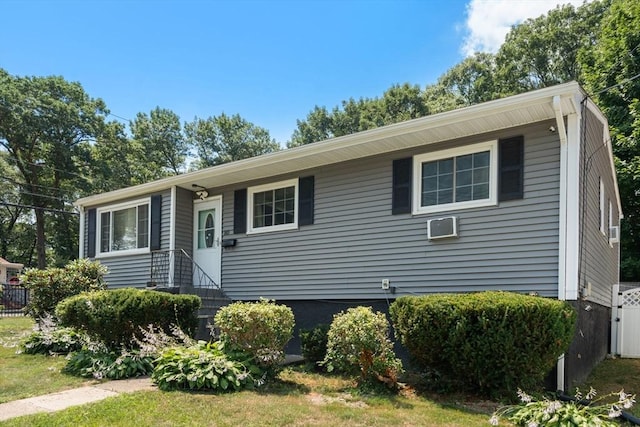 80 Messinger St, Boston, MA 02126 - ranch-style house with a wall mounted air conditioner