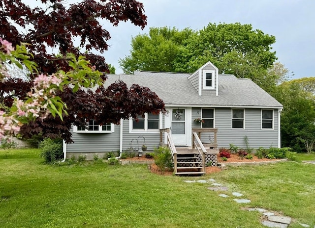 view of front of home with a front lawn