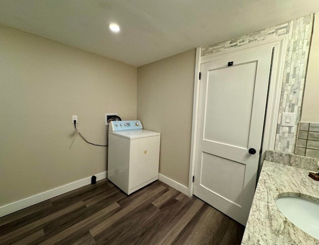 laundry room with sink, washer / clothes dryer, and dark hardwood / wood-style flooring